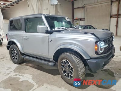 Czwarte zdjęcie samochodu z boku: 2023 FORD BRONCO BASE VIN:1FMDE5CP5PLB21572 - miniatura