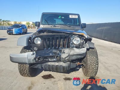Piąte zdjęcie samochodu w środku: 2017 JEEP WRANGLER SPORT VIN:1C4AJWAG4HL657605 - miniatura