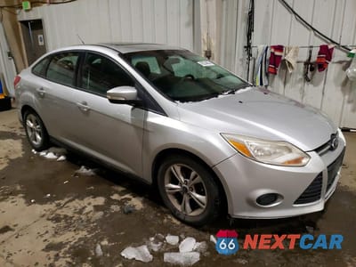 Czwarte zdjęcie samochodu z boku: 2014 FORD FOCUS SE VIN:1FADP3F21EL312511 - miniatura