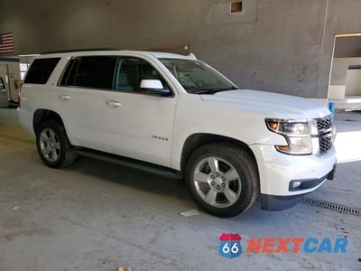 Czwarte zdjęcie samochodu z boku: 2018 CHEVROLET TAHOE K1500 LT VIN:1GNSKBKC5JR173149 - miniatura