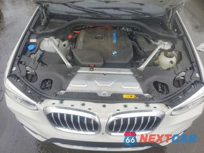 Zdjęcie 12 z 13 samochodu: 2021 BMW X3 XDRIVE30E VIN:5UXTS1C00M9H70629 - miniatura