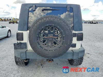 Zdjęcie 6 z 14 samochodu: 2009 JEEP WRANGLER UNLIMITED X VIN:1J4GA39139L770935 - miniatura