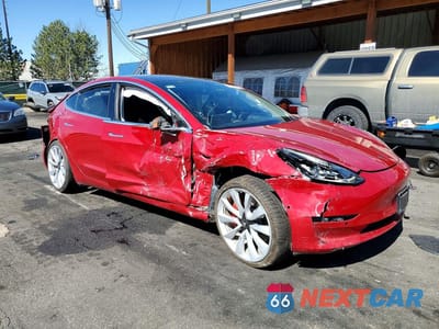 Czwarte zdjęcie samochodu z boku: 2018 TESLA MODEL 3 VIN:5YJ3E1EB2JF072853 - miniatura