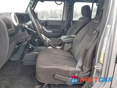 Zdjęcie 7 z 11 samochodu: 2013 JEEP WRANGLER UNLIMITED SAHARA VIN:1C4BJWEG9DL602625 - miniatura