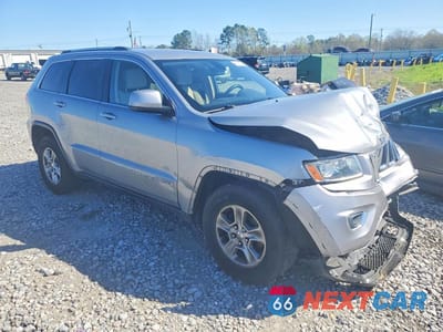 Czwarte zdjęcie samochodu z boku: 2014 JEEP GRAND CHEROKEE LAREDO VIN:1C4RJEAG4EC433114 - miniatura