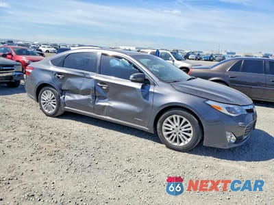 Czwarte zdjęcie samochodu z boku: 2014 TOYOTA AVALON HYBRID XLE TOURING VIN:4T1BD1EB7EU035417 - miniatura