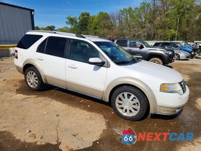 Czwarte zdjęcie samochodu z boku: 2008 FORD TAURUS X EDDIE BAUER VIN:1FMDK07W48GA09823 - miniatura