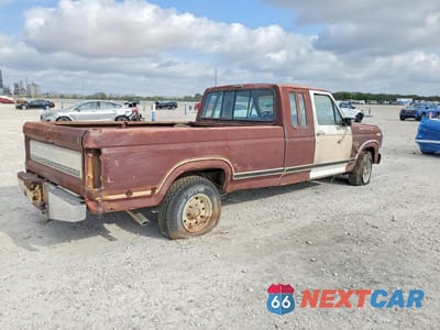 Trzecie zdjęcie samochodu z tyłu: 1983 FORD F-150 VIN:1FTEX15F4DKA33680 - miniatura