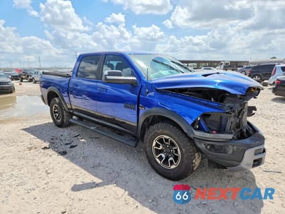 Czwarte zdjęcie samochodu z boku: 2018 RAM 1500 REBEL VIN:1C6RR6YT4JS223279 - miniatura