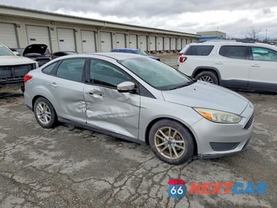 Czwarte zdjęcie samochodu z boku: 2016 FORD FOCUS SE VIN:1FADP3F24GL268636 - miniatura