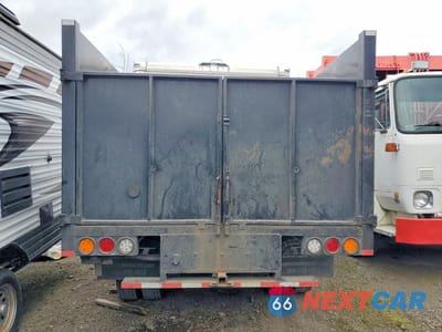Zdjęcie 6 z 13 samochodu: 2019 ISUZU NPR HD FLATBED TRUCK VIN:54DC4W1B9KS808404 - miniatura