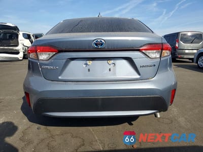 Zdjęcie 6 z 12 samochodu: 2022 TOYOTA COROLLA HYBRID LE VIN:JTDEAMDE4NJ052796 - miniatura