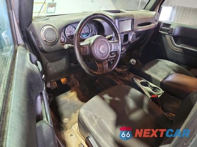 Zdjęcie 8 z 13 samochodu: 2016 JEEP WRANGLER SPORT VIN:1C4AJWAG1GL181831 - miniatura