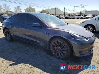 Czwarte zdjęcie samochodu z boku: 2023 TESLA MODEL 3 VIN:5YJ3E1EC0PF576366 - miniatura