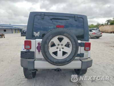 Zdjęcie 6 z 14 samochodu: 2012 JEEP WRANGLER UNLIMITED SAHARA VIN:1C4BJWEG5CL190296 - miniatura