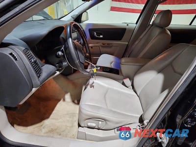 Zdjęcie 7 z 14 samochodu: 2004 CADILLAC SRX VIN:1GYEE637X40191204 - miniatura