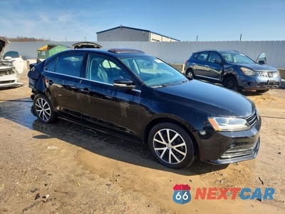 Czwarte zdjęcie samochodu z boku: 2017 VOLKSWAGEN JETTA SE VIN:3VWB67AJXHM246616 - miniatura