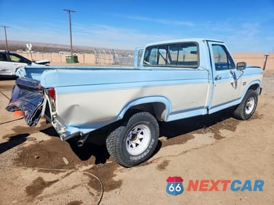 Trzecie zdjęcie samochodu z tyłu: 1985 FORD F150 VIN:1FTEF14Y1FPB06435 - miniatura