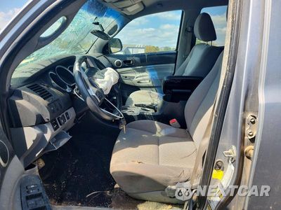 Zdjęcie 7 z 12 samochodu: 2014 TOYOTA TACOMA V6 VIN:3TMLU4EN1EM143539 - miniatura