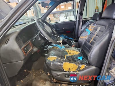 Zdjęcie 7 z 14 samochodu: 1997 JEEP GRAND CHEROKEE LAREDO VIN:1J4GZ58S6VC714724 - miniatura