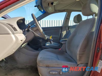 Zdjęcie 7 z 11 samochodu: 2004 TOYOTA CAMRY LE VIN:4T1BE32K34U310373 - miniatura