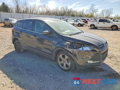 Czwarte zdjęcie samochodu z boku: 2015 FORD ESCAPE SE VIN:1FMCU0G7XFUB59416 - miniatura