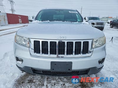 Piąte zdjęcie samochodu w środku: 2012 JEEP GRAND CHEROKEE LAREDO VIN:1C4RJEAGXCC137222 - miniatura