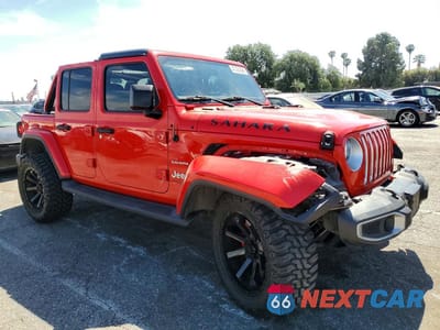 Czwarte zdjęcie samochodu z boku: 2019 JEEP WRANGLER UNLIMITED SAHARA VIN:1C4HJXEN5KW593531 - miniatura