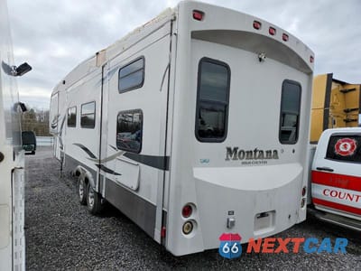 Trzecie zdjęcie samochodu z tyłu: 2011 KEYSTONE MONTANA CAMPER VIN:4YDF33327BA740607 - miniatura