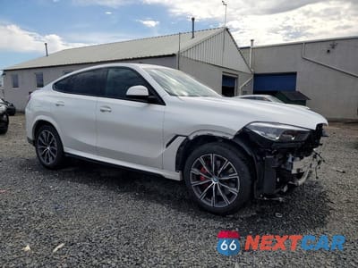 Czwarte zdjęcie samochodu z boku: 2023 BMW X6 XDRIVE40I VIN:5UXCY6C09P9P83201 - miniatura