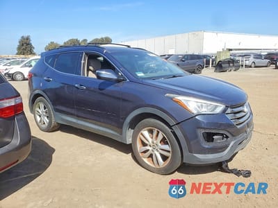 Czwarte zdjęcie samochodu z boku: 2014 HYUNDAI SANTA FE SPORT 2.0T VIN:5XYZUDLA8EG226005 - miniatura