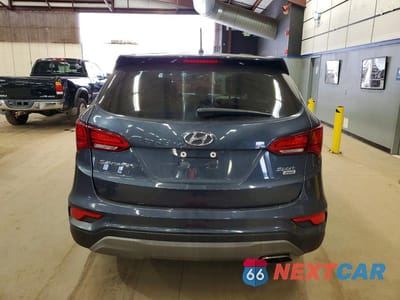 Zdjęcie 6 z 12 samochodu: 2018 HYUNDAI SANTA FE SPORT 2.4L VIN:5NMZTDLB6JH084880 - miniatura