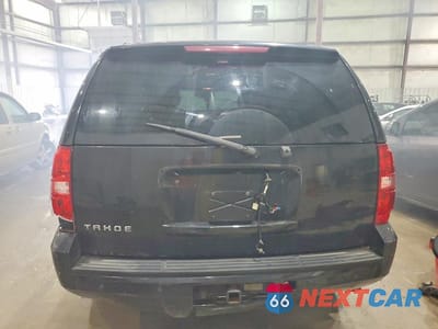 Zdjęcie 6 z 12 samochodu: 2011 CHEVROLET TAHOE C1500 LS VIN:1GNSCAE01BR243059 - miniatura