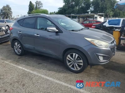 Czwarte zdjęcie samochodu z boku: 2014 HYUNDAI TUCSON LIMITED VIN:KM8JU3AG3EU835981 - miniatura