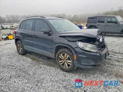 Czwarte zdjęcie samochodu z boku: 2017 VOLKSWAGEN TIGUAN S VIN:WVGBV7AX3HK040437 - miniatura