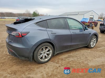 Trzecie zdjęcie samochodu z tyłu: 2023 TESLA MODEL Y VIN:7SAYGAEE3PF788845 - miniatura