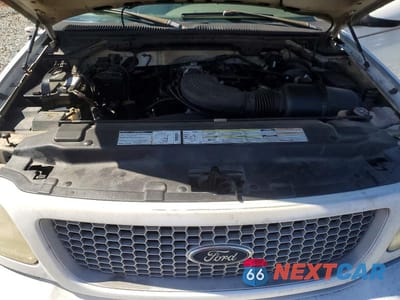 Zdjęcie 11 z 11 samochodu: 1999 FORD F-150 VIN:2FTRX08L3XCA87784 - miniatura