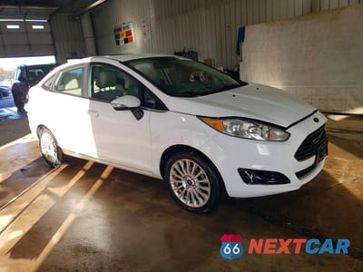 Czwarte zdjęcie samochodu z boku: 2015 FORD FIESTA TITANIUM VIN:3FADP4CJ3FM205445 - miniatura