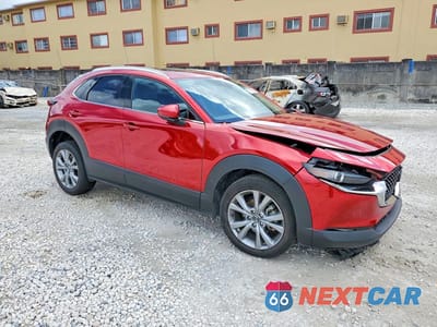 Czwarte zdjęcie samochodu z boku: 2023 MAZDA CX-30 PREMIUM VIN:3MVDMBDMXPM518508 - miniatura
