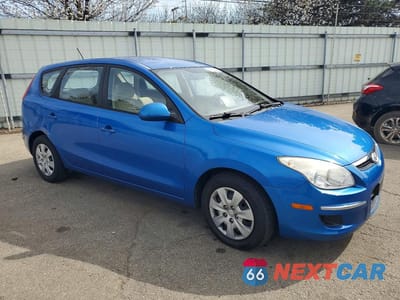 Czwarte zdjęcie samochodu z boku: 2010 HYUNDAI ELANTRA TOURING GLS VIN:KMHDB8AE7AU080665 - miniatura