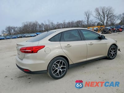 Trzecie zdjęcie samochodu z tyłu: 2017 FORD FOCUS SE VIN:1FADP3FE6HL292903 - miniatura
