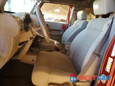 Zdjęcie 7 z 11 samochodu: 2007 JEEP WRANGLER SAHARA VIN:1J4GB59197L208334 - miniatura