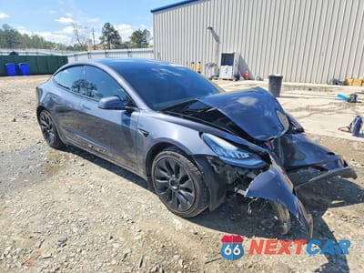 Czwarte zdjęcie samochodu z boku: 2022 TESLA MODEL 3 VIN:5YJ3E1EB4NF259484 - miniatura