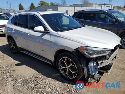 Czwarte zdjęcie samochodu z boku: 2016 BMW X1 XDRIVE28I VIN:WBXHT3C39G5E48063 - miniatura