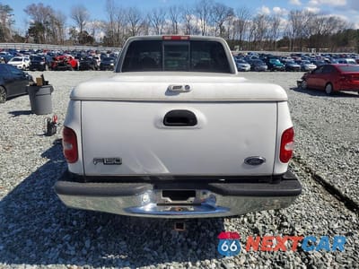 Zdjęcie 6 z 11 samochodu: 1999 FORD F-150 VIN:2FTRX08L3XCA87784 - miniatura