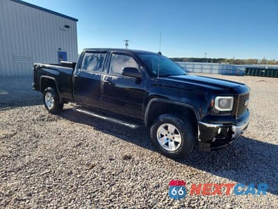 Czwarte zdjęcie samochodu z boku: 2014 GMC SIERRA K1500 SLT VIN:3GTU2VEC1EG108366 - miniatura