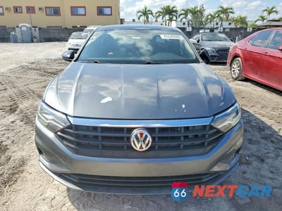 Piąte zdjęcie samochodu w środku: 2019 VOLKSWAGEN JETTA S VIN:3VWC57BU3KM084433 - miniatura