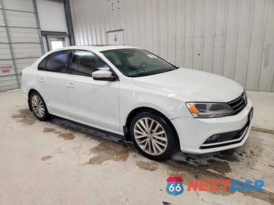 Czwarte zdjęcie samochodu z boku: 2016 VOLKSWAGEN JETTA SEL VIN:3VWL07AJ4GM206259 - miniatura