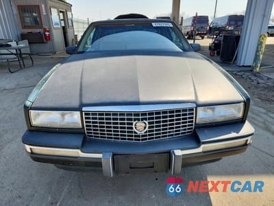 Piąte zdjęcie samochodu w środku: 1991 CADILLAC ELDORADO VIN:1G6EL13B1MU613858 - miniatura