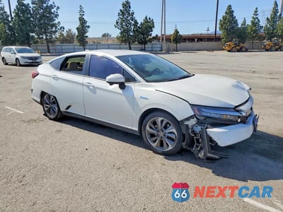 Czwarte zdjęcie samochodu z boku: 2020 HONDA CLARITY TOURING VIN:JHMZC5F32LC000631 - miniatura